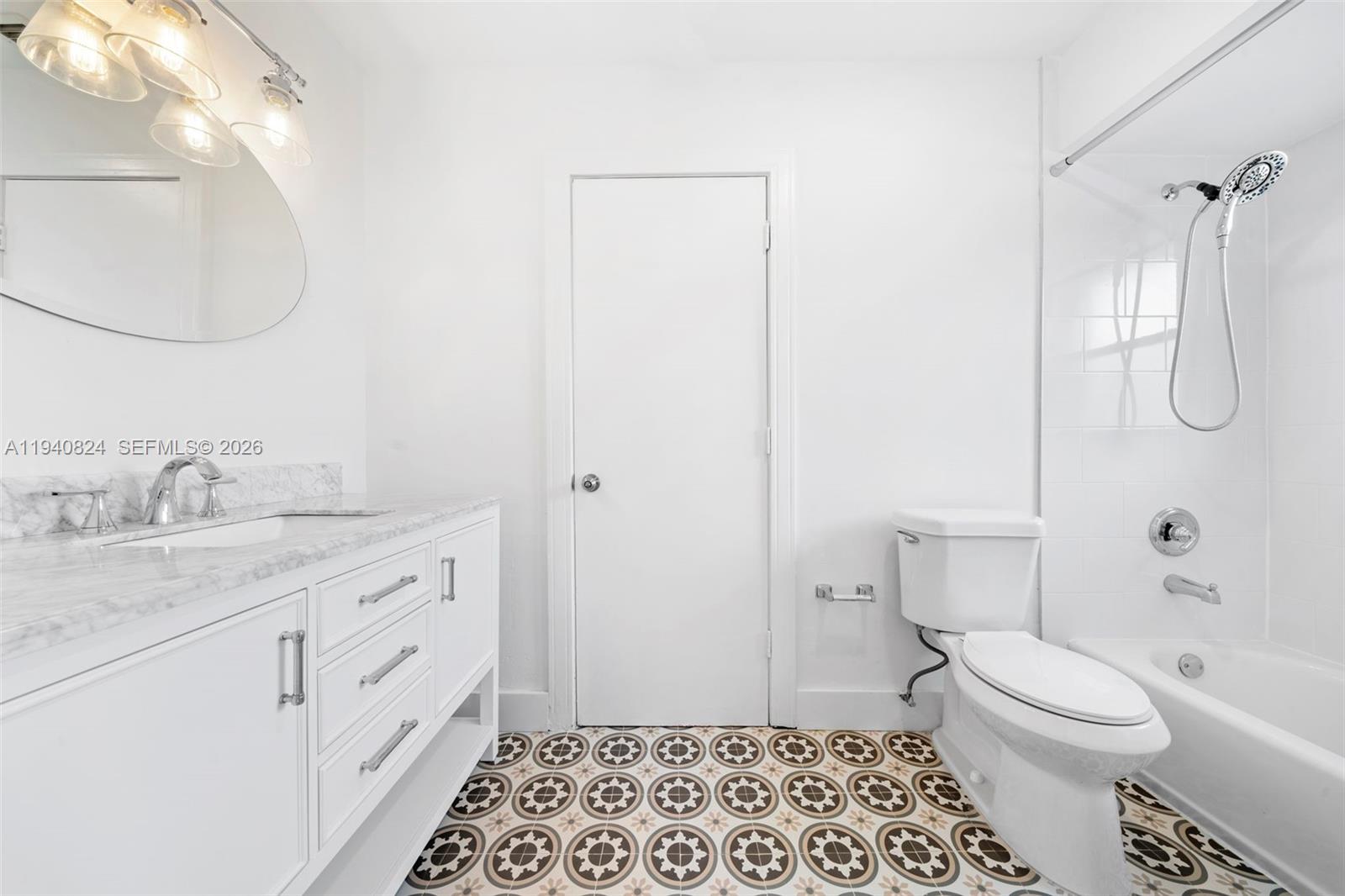 10424 Southwest 114th Court Miami, FL 33176 - Photo 9 of 23 a bathroom with a granite countertop sink toilet and shower