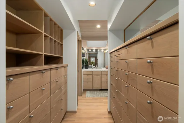 a kitchen with cabinets and window