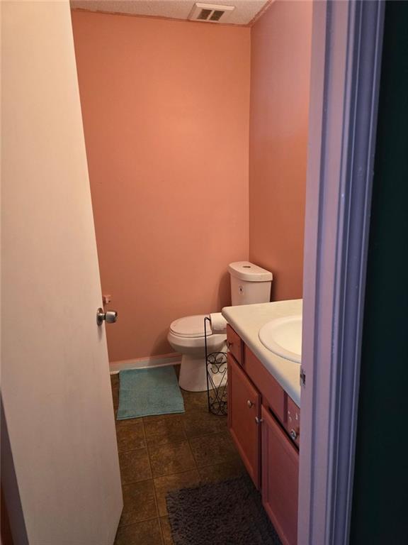 29 Quail Run, Unit B Decatur, GA 30035 - Photo 16 of 16 a bathroom with a sink and toilet