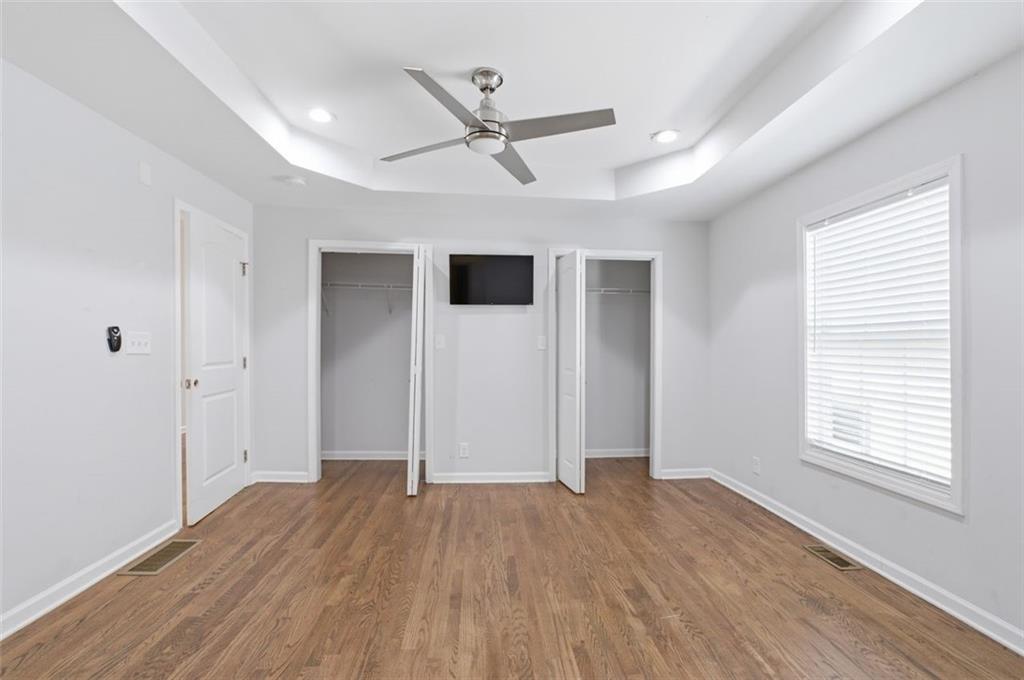 85 Meldon Avenue Southeast Atlanta, GA 30315 - Photo 15 of 39 a view of empty room with wooden floor and fan