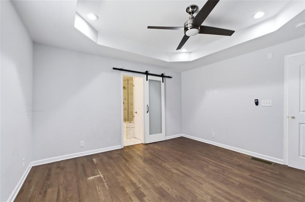 85 Meldon Avenue Southeast Atlanta, GA 30315 - Photo 17 of 39 a view of empty room with wooden floor