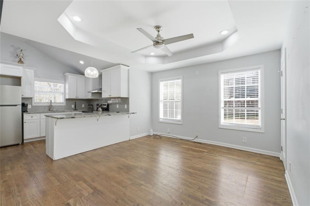 85 Meldon Avenue Southeast Atlanta, GA 30315 - Photo 22 of 39 a kitchen with white cabinets and window