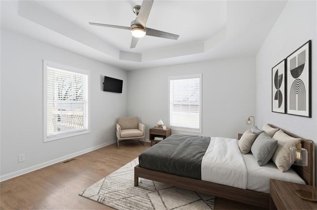 85 Meldon Avenue Southeast Atlanta, GA 30315 - Photo 9 of 39 a bedroom with a bed couch and window