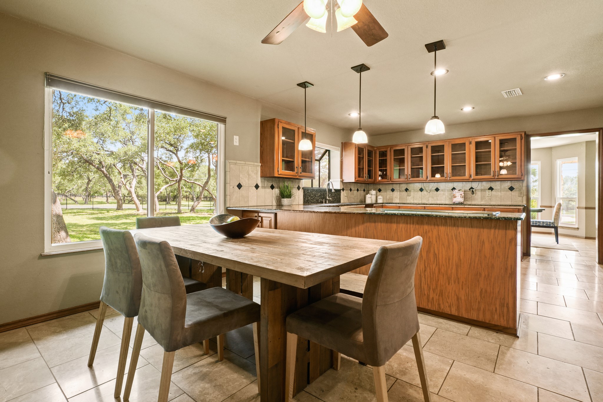 176 Logan Ranch Road Georgetown, TX 78628 - Photo 5 of 38 Dining room with plenty of natural light, ceiling fan, recessed lighting, and light tile patterned floors