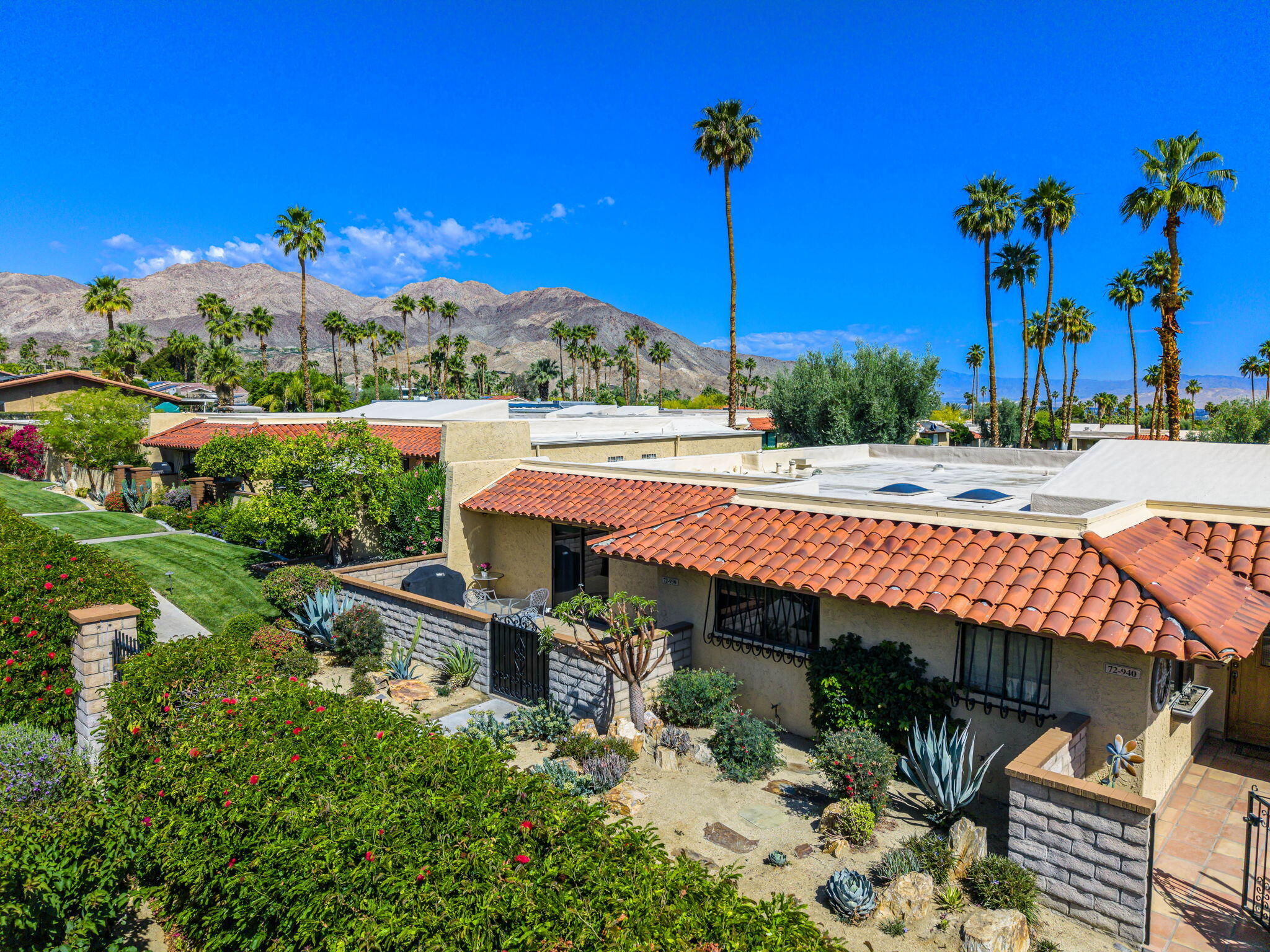 72930 Mesa View Drive Palm Desert, CA 92260 - Photo 12 of 40 a view of a patio with a table and chairs