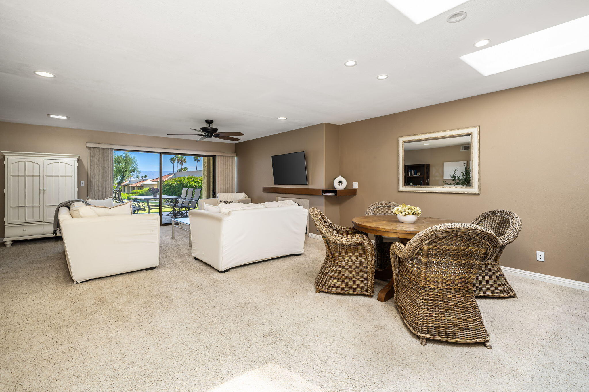 72930 Mesa View Drive Palm Desert, CA 92260 - Photo 16 of 40 a living room with furniture and a flat screen tv