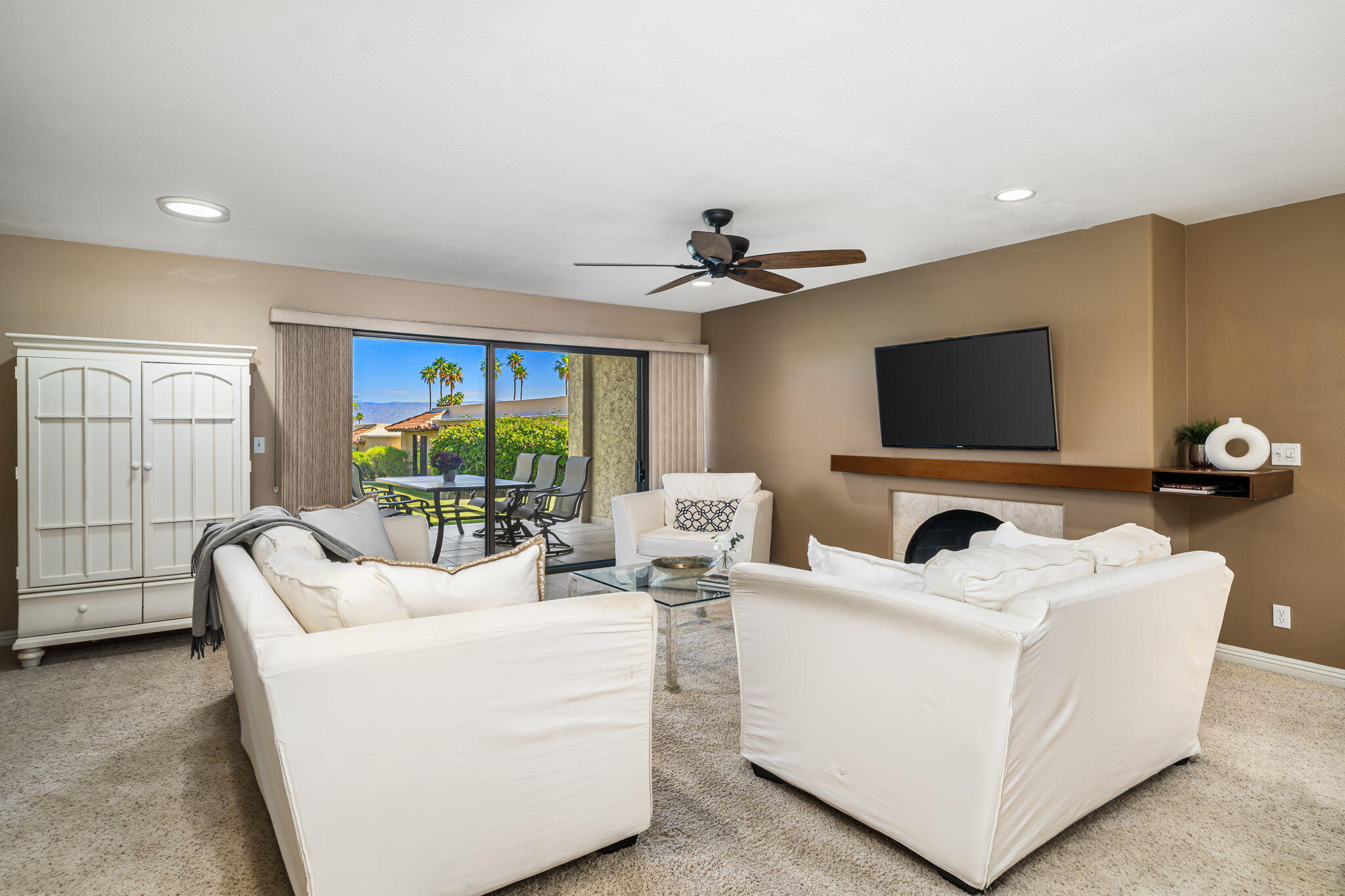 72930 Mesa View Drive Palm Desert, CA 92260 - Photo 18 of 40 a living room with furniture and a flat screen tv
