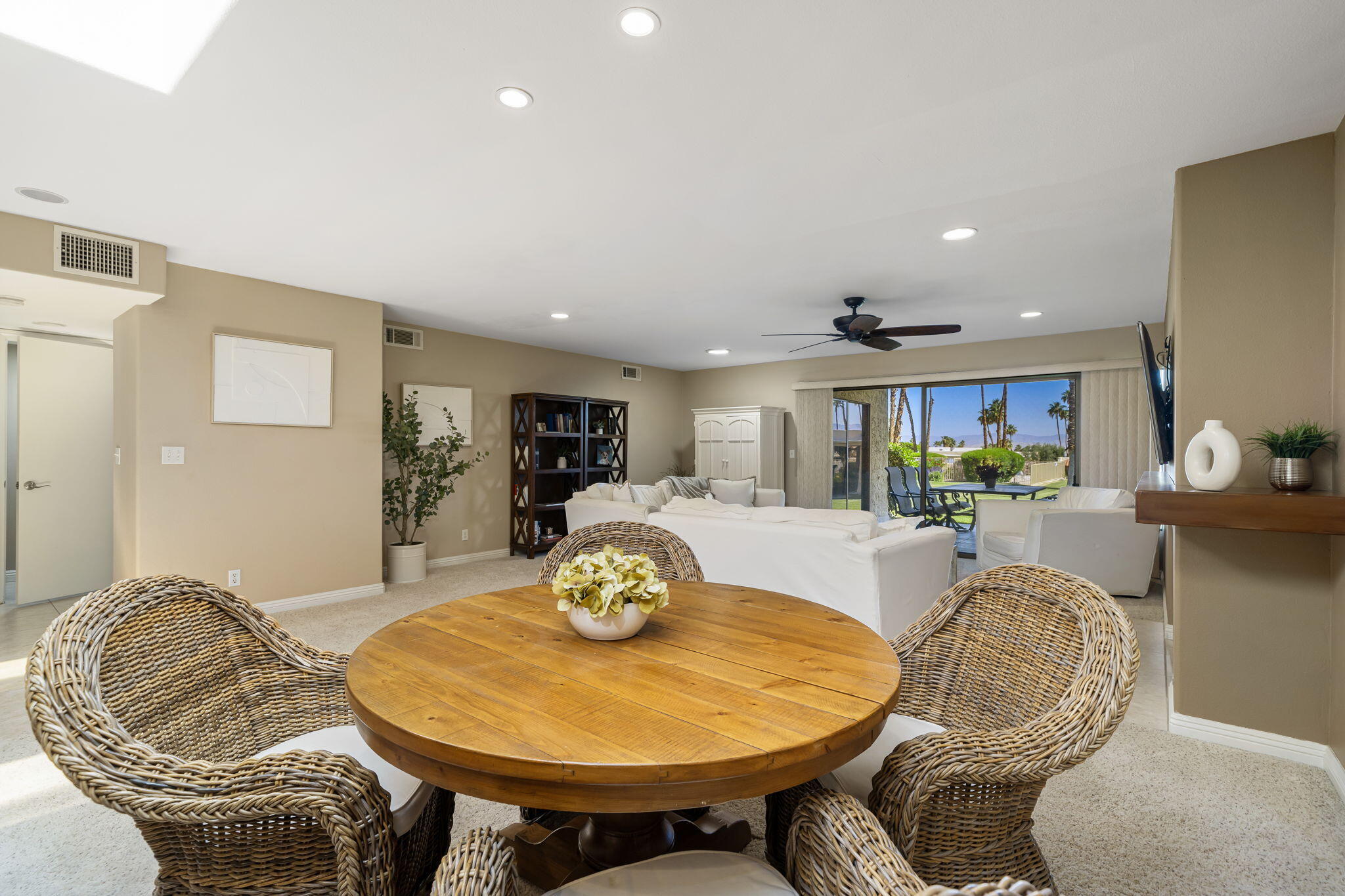 72930 Mesa View Drive Palm Desert, CA 92260 - Photo 2 of 40 a living room with furniture and a dining table