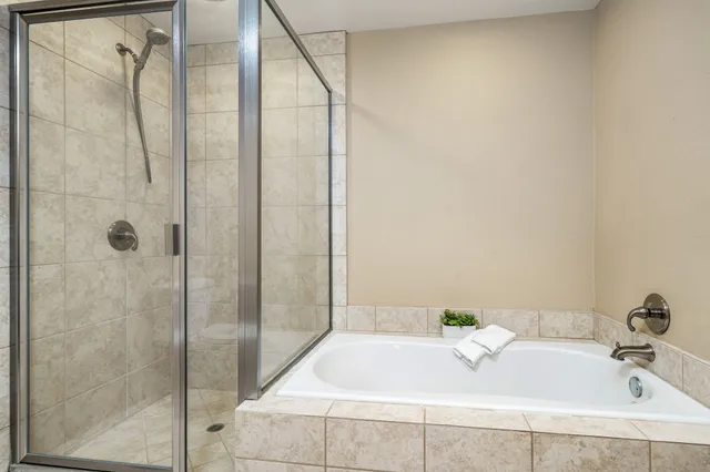 a bathroom with a sink and a shower