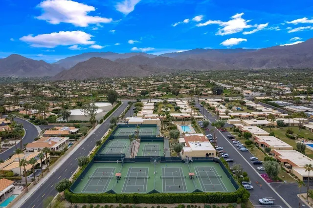 a view of a city with mountains