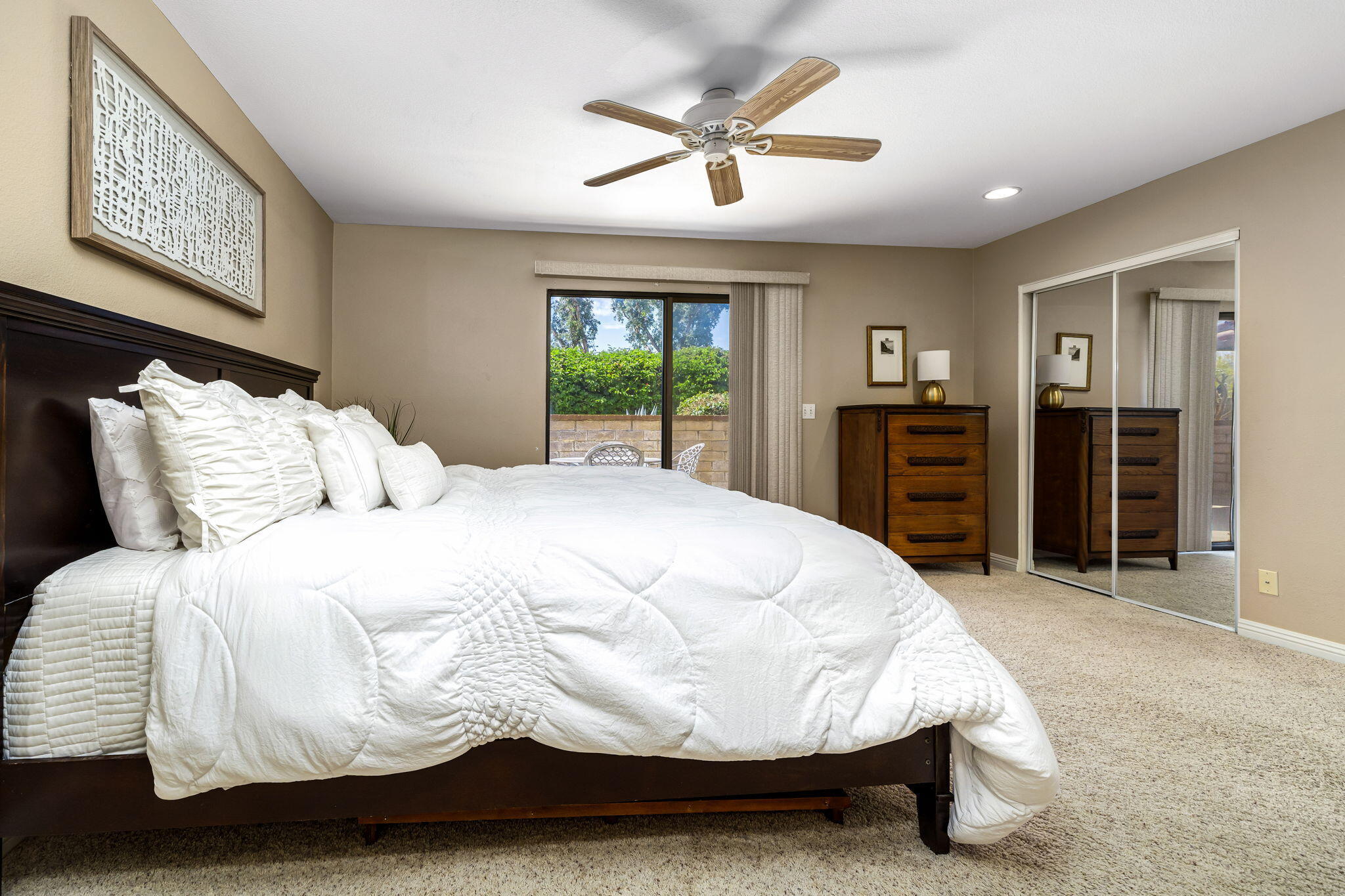 72930 Mesa View Drive Palm Desert, CA 92260 - Photo 7 of 40 a bedroom with a bed and a chandelier