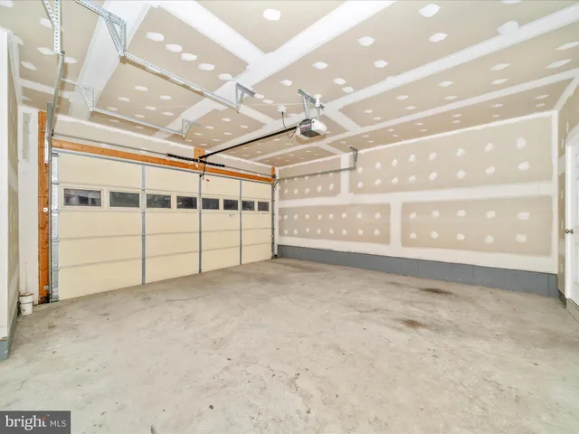 a kitchen with granite countertop a sink and a window