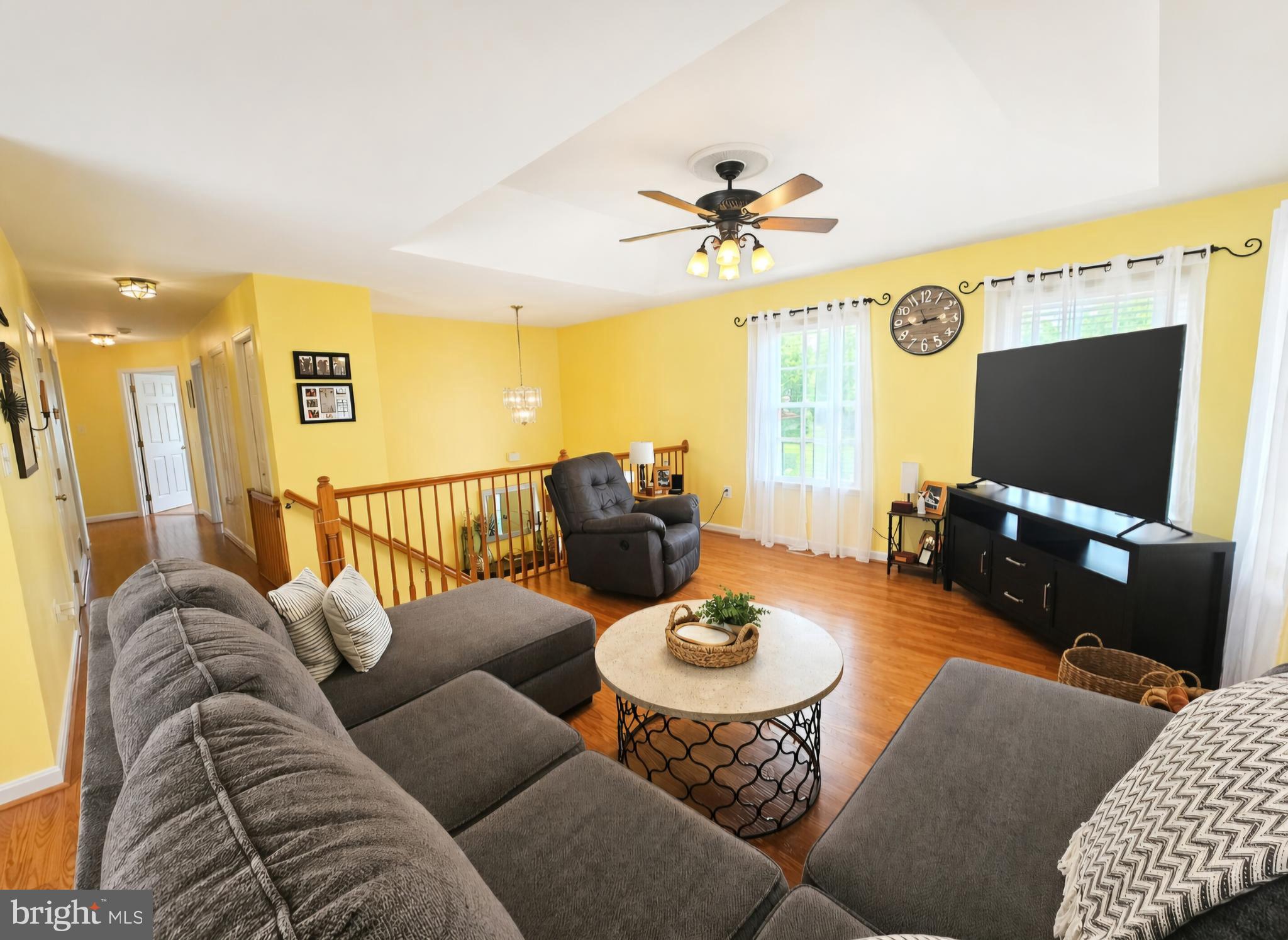 61 Clemson Lane Falling Waters, WV 25419 - Photo 9 of 37 a living room with furniture and a flat screen tv