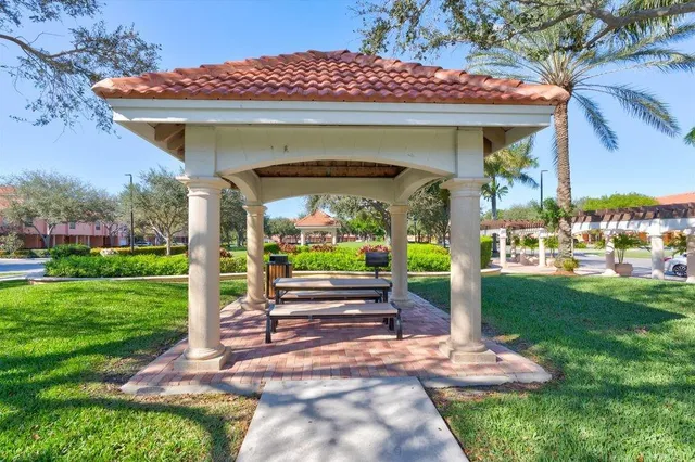 a view of a swimming pool with a patio