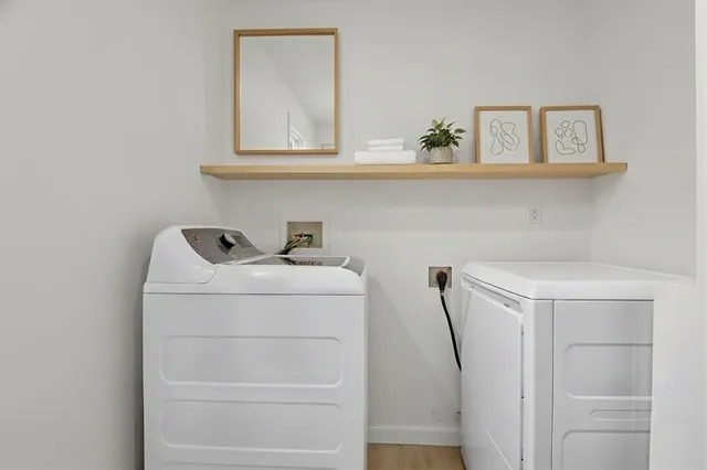 a utility room with dryer and washer