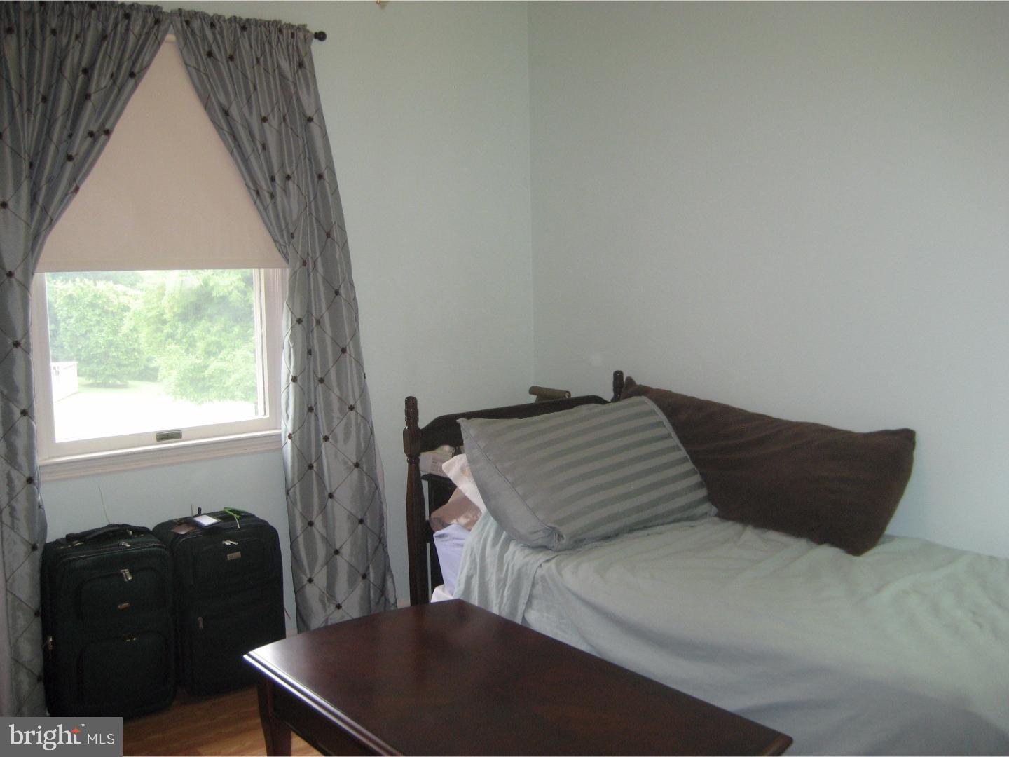 14-4 Cranberry Ridge, Unit 3 Reading, PA 19606 - Photo 19 of 24 a bedroom with a bed and a closet