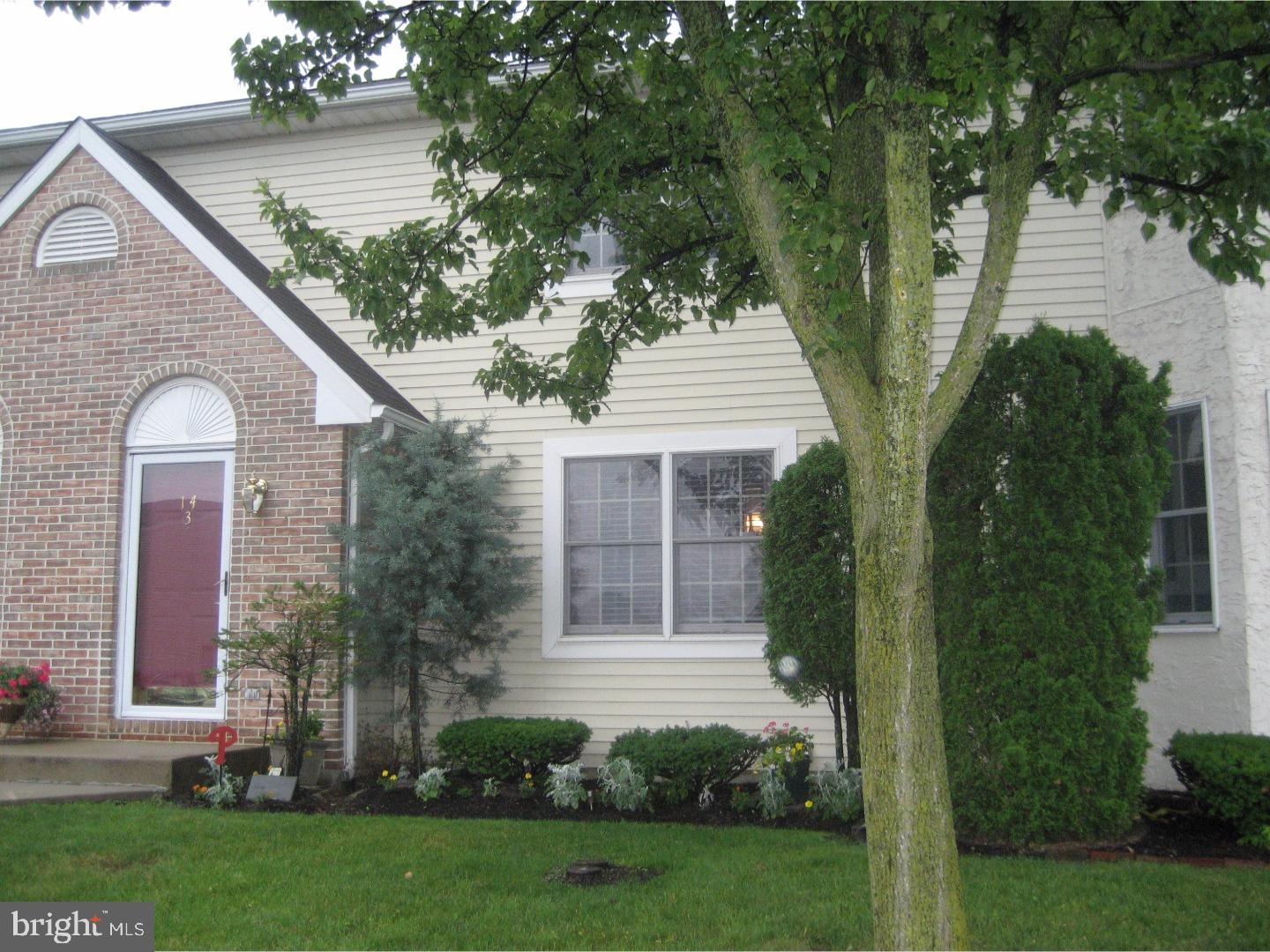14-4 Cranberry Ridge, Unit 3 Reading, PA 19606 - Photo 24 of 24 a front view of a house with a garden