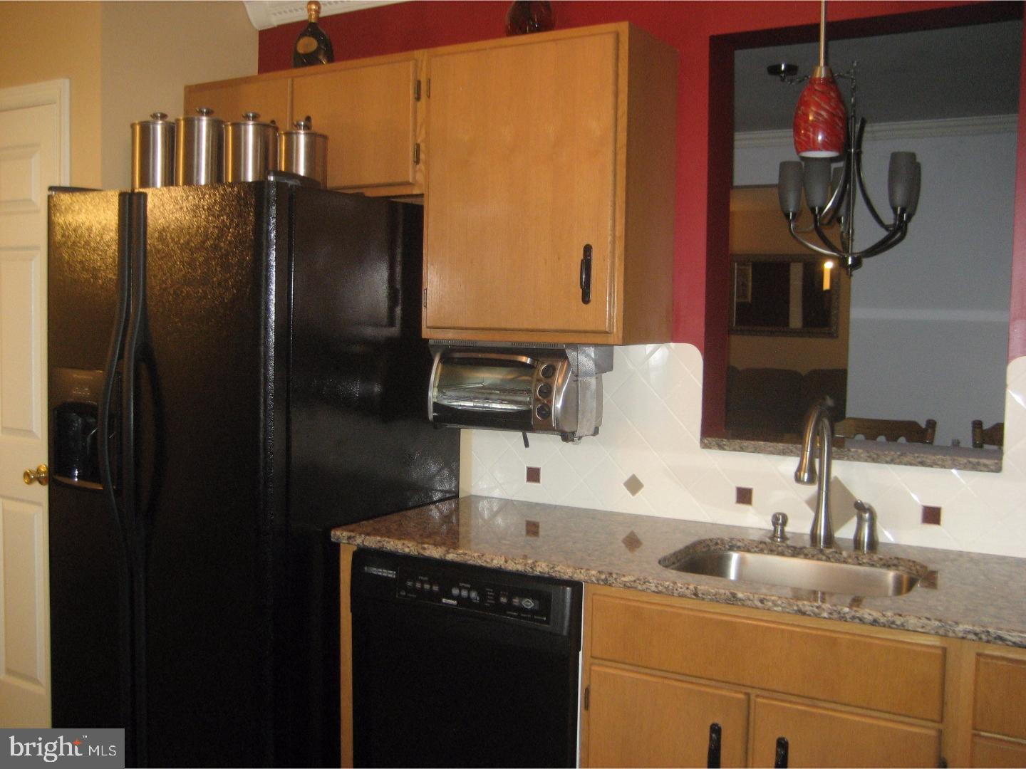 14-4 Cranberry Ridge, Unit 3 Reading, PA 19606 - Photo 5 of 24 a kitchen with a sink and refrigerator