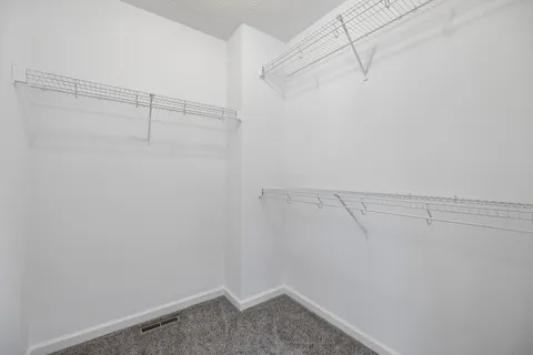 a bath tub sitting next to a window