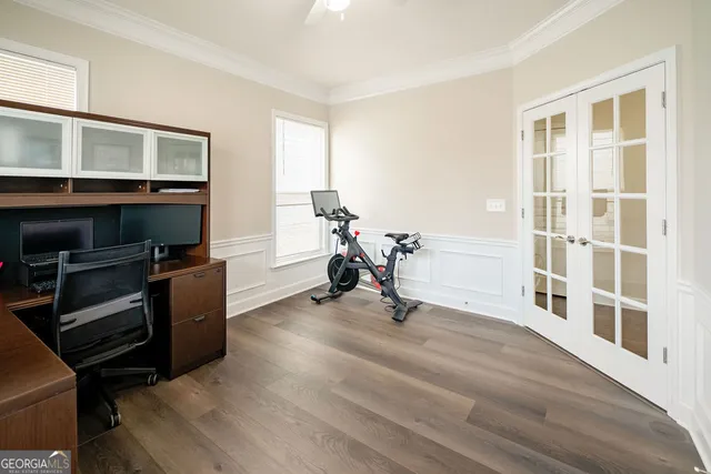 a view of a livingroom with furniture and a window