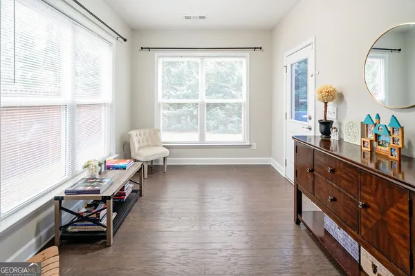 a room with furniture and a window