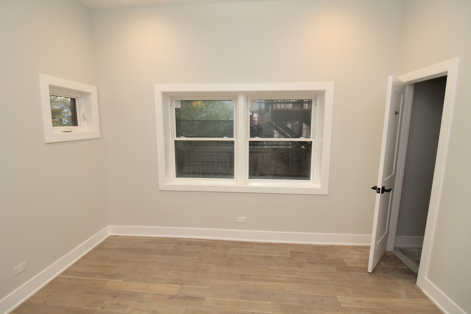 64 East Cedar Street, Unit 2R Chicago, IL 60611 - Photo 13 of 17 a view of an empty room with a window