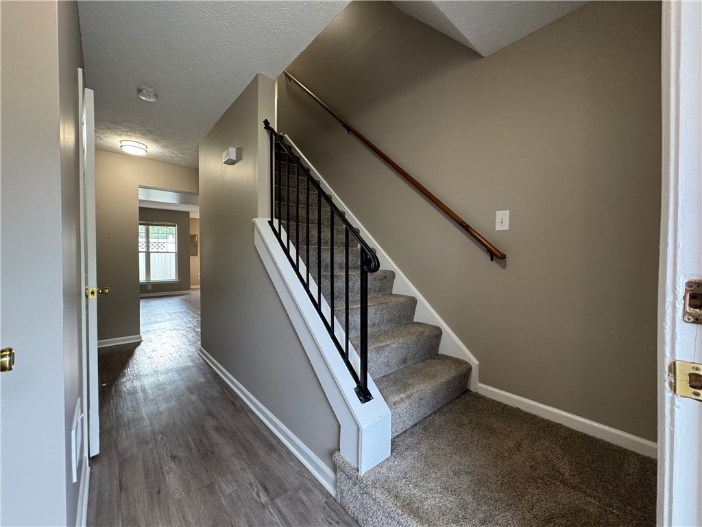 778 Royal Sunset Drive Webster, NY 14580 - Photo 11 of 38 Typical view from inside the front door of stairs