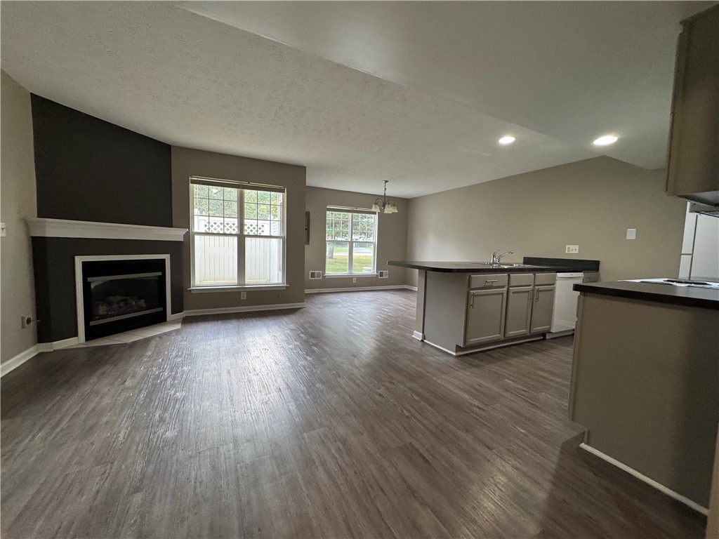 778 Royal Sunset Drive Webster, NY 14580 - Photo 14 of 38 View of typical great room with cozy fireplace