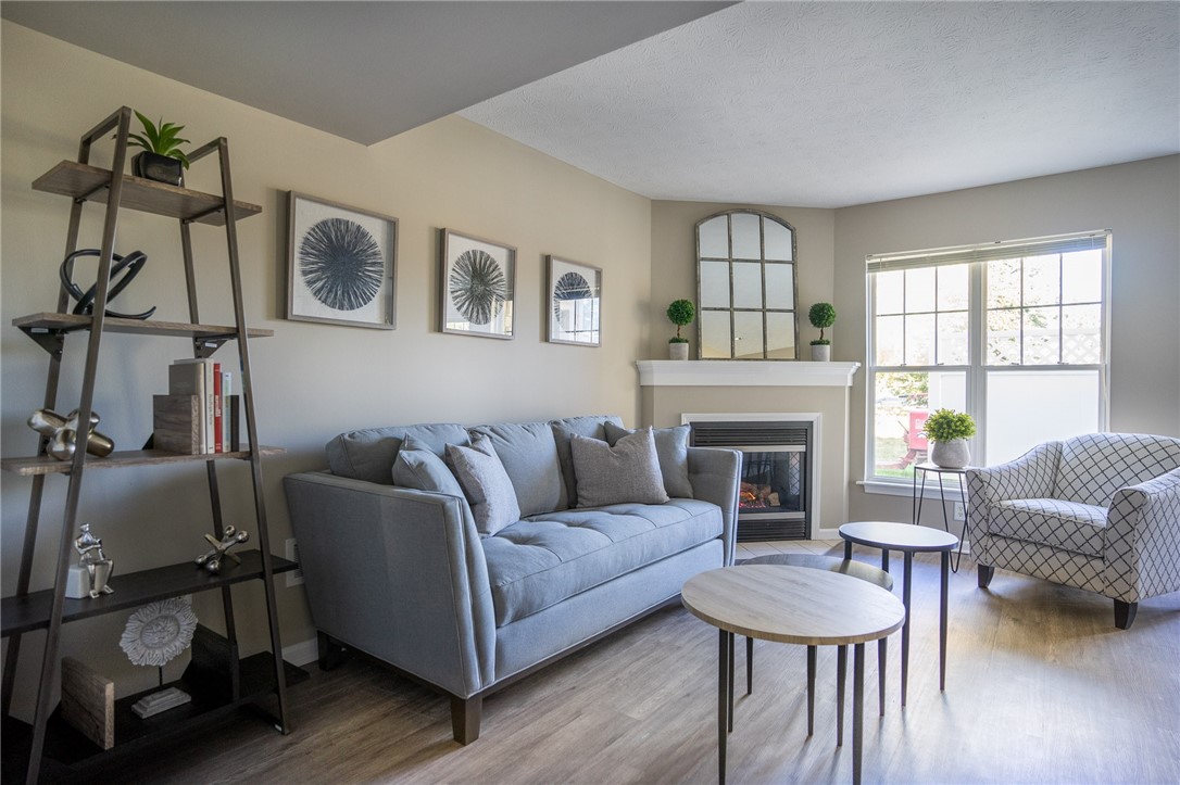 778 Royal Sunset Drive Webster, NY 14580 - Photo 2 of 38 View of typical Great Room's living area with faux