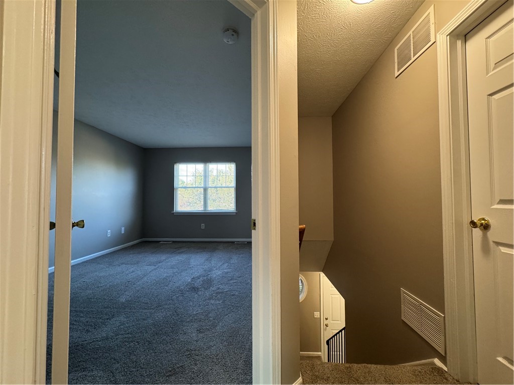 778 Royal Sunset Drive Webster, NY 14580 - Photo 21 of 38 Typical view into primary bedroom from second floo