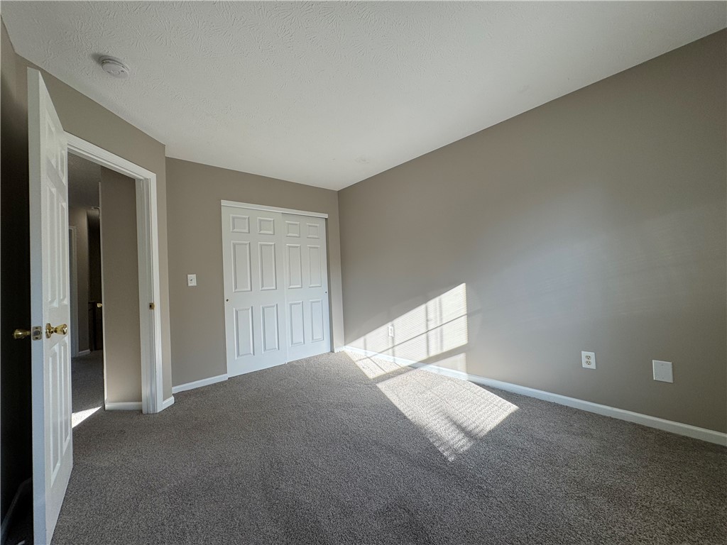778 Royal Sunset Drive Webster, NY 14580 - Photo 29 of 38 Typical other bedroom closet