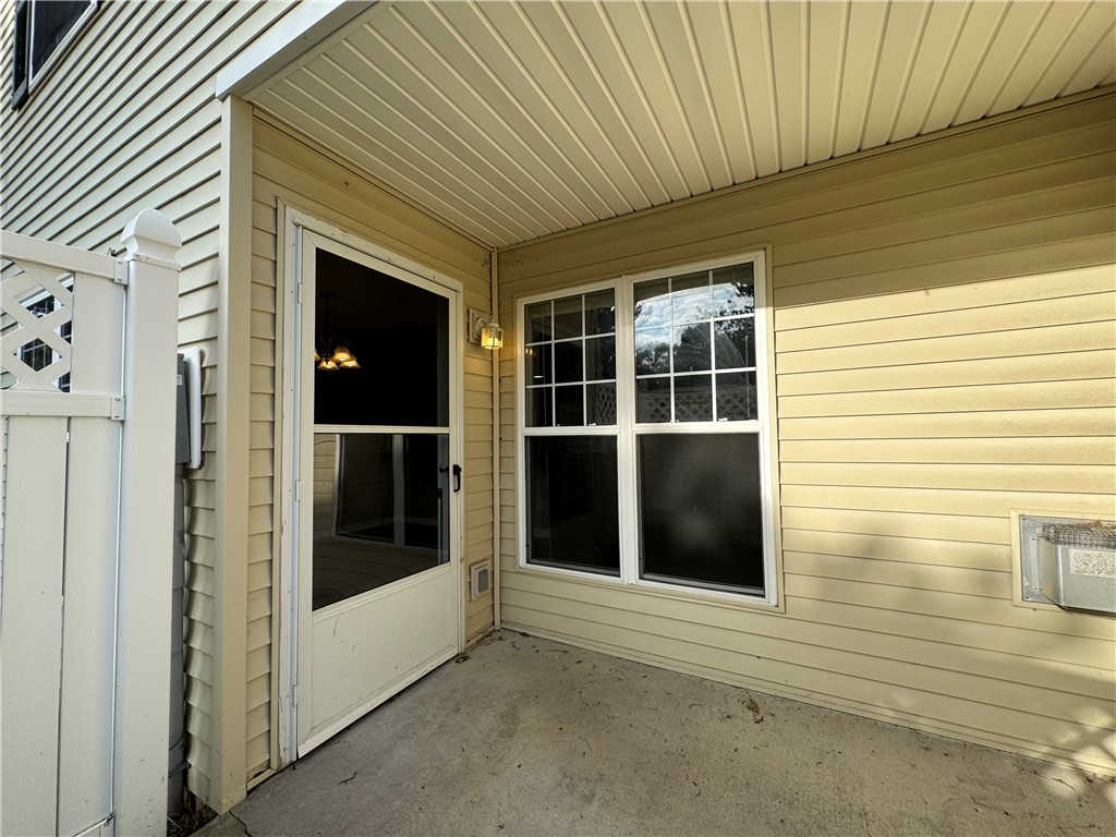 778 Royal Sunset Drive Webster, NY 14580 - Photo 32 of 38 Typical covered private patio