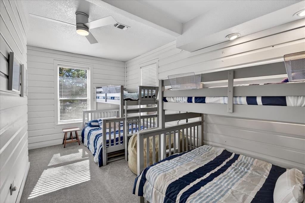 353 Winding Shore Tool, TX 75143 - Photo 27 of 35 a bedroom with furniture and a window