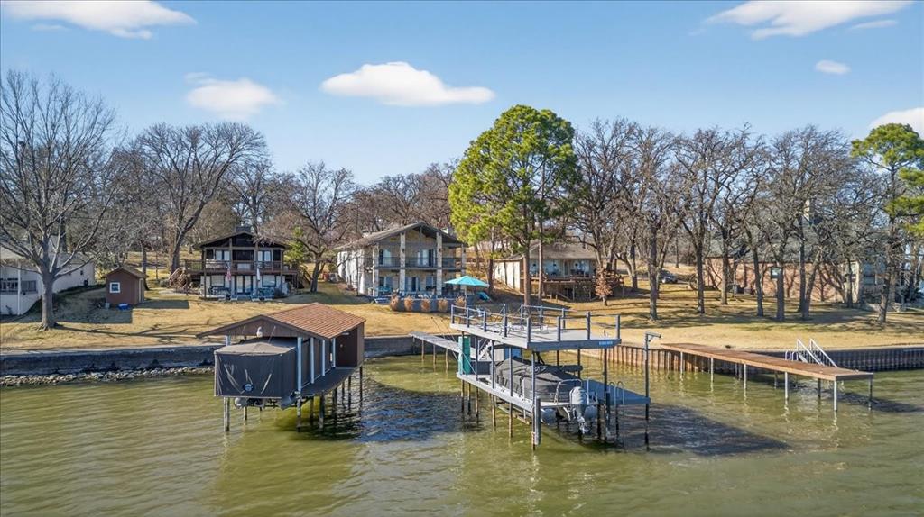 353 Winding Shore Tool, TX 75143 - Photo 35 of 35 a view of house with swimming pool and outdoor seating