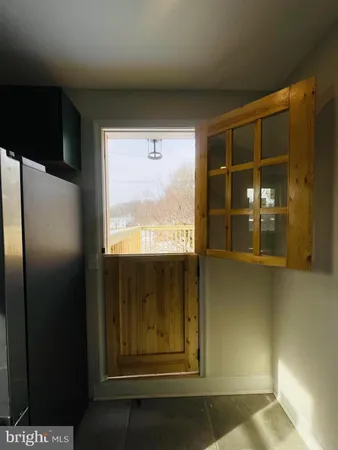 a kitchen with a stove and a microwave