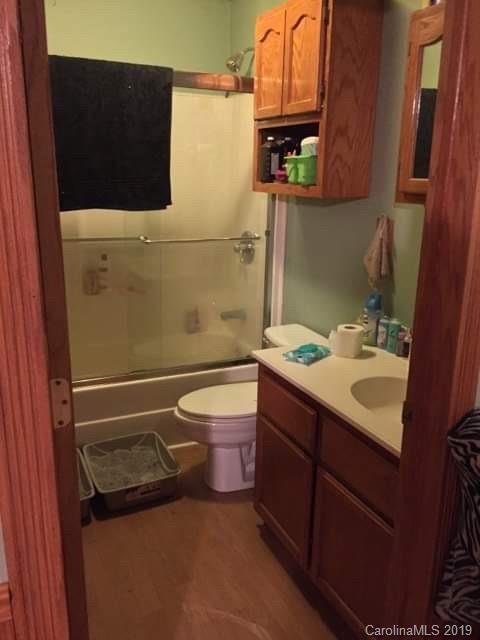 385 Pipers Neck Rutherfordton, NC 28139 - Photo 10 of 13 a bathroom with a sink a toilet and shower