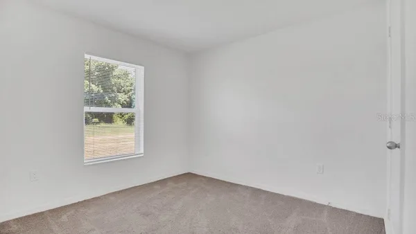an empty room with a window