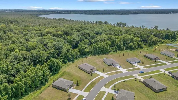 an aerial view of a tennis ground