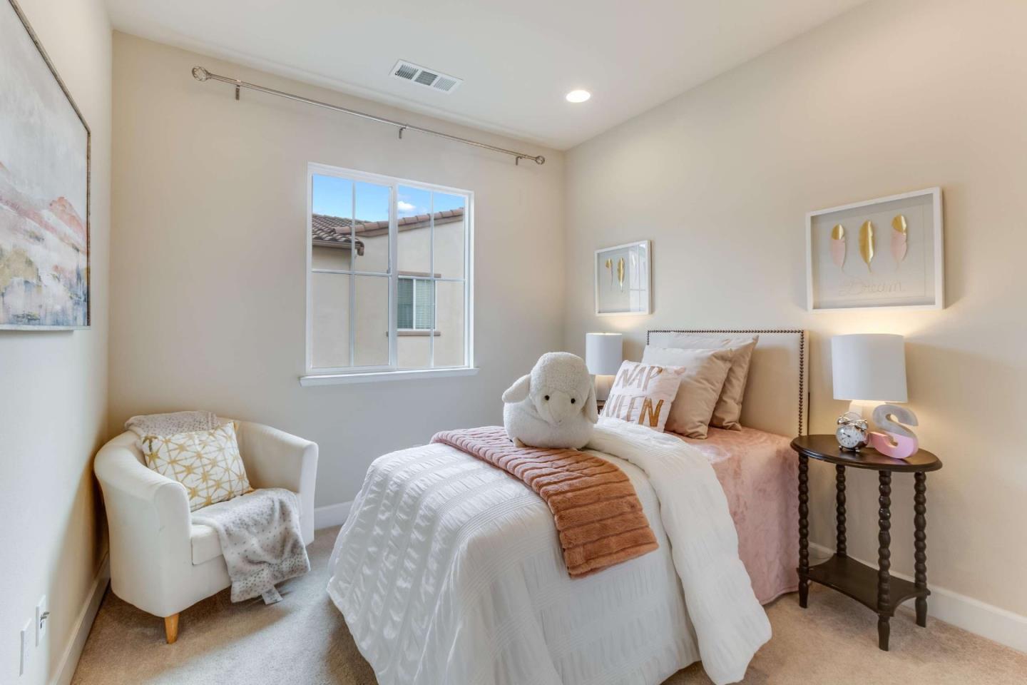 579 Holthouse Terrace Sunnyvale, CA 94087 - Photo 26 of 37 a bedroom with a bed and a couch