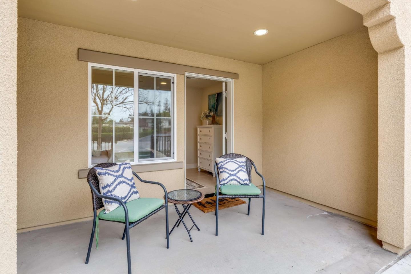 579 Holthouse Terrace Sunnyvale, CA 94087 - Photo 30 of 37 a living room with furniture and a window