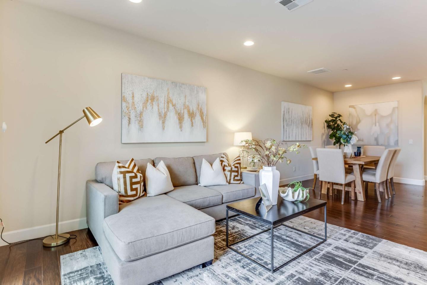 579 Holthouse Terrace Sunnyvale, CA 94087 - Photo 3 of 37 a living room with furniture and wooden floor