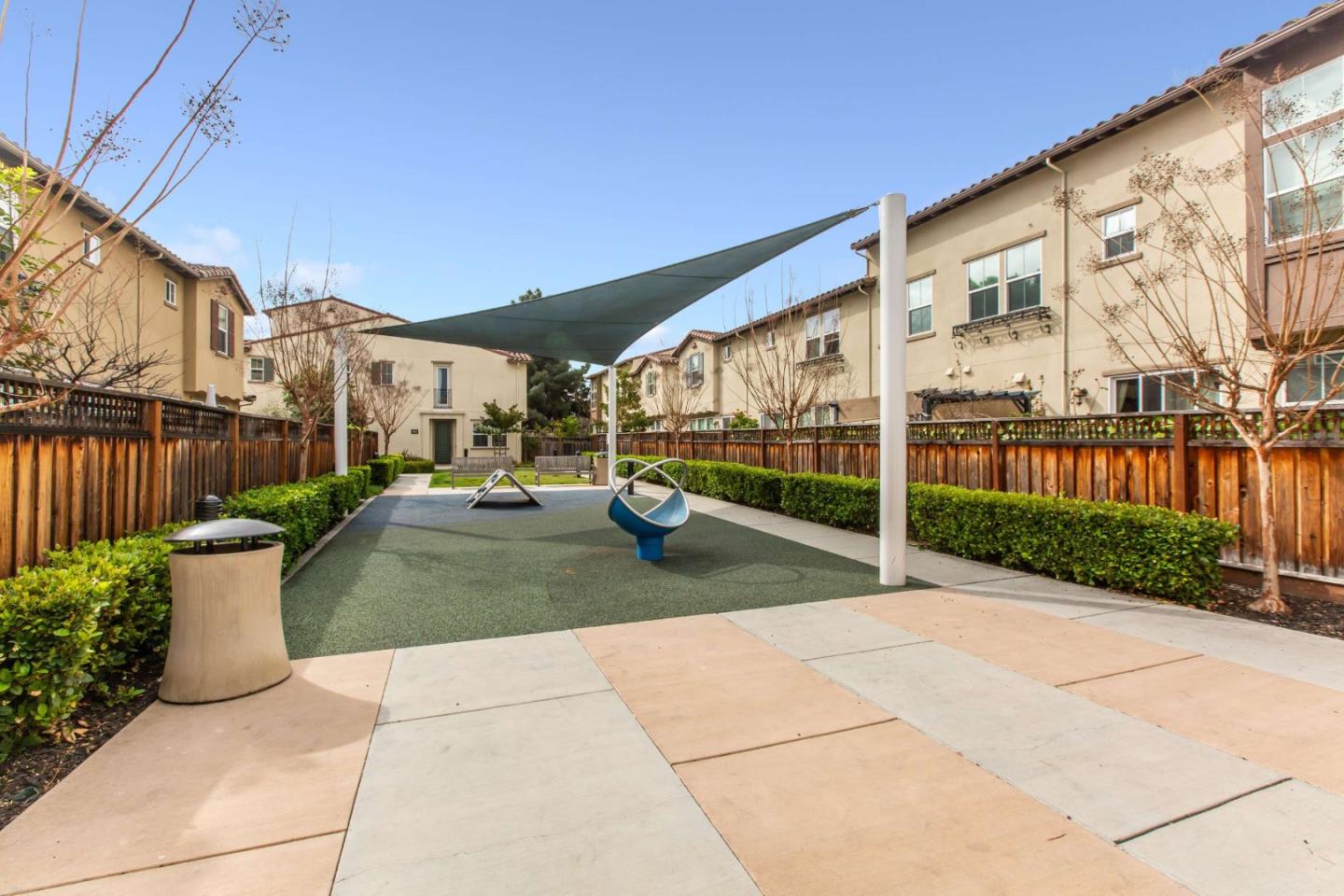 579 Holthouse Terrace Sunnyvale, CA 94087 - Photo 35 of 37 a view of a building with backyard