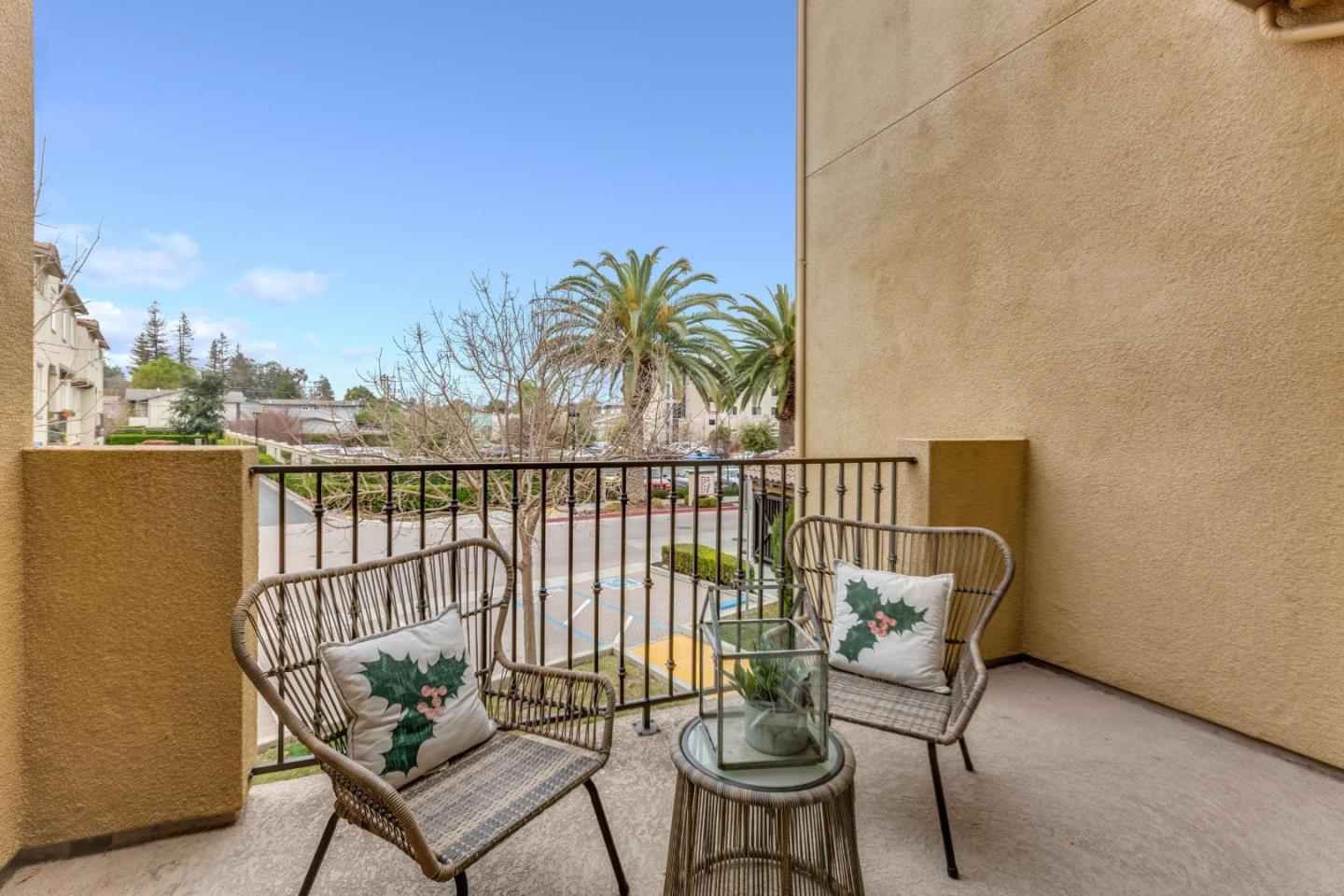 579 Holthouse Terrace Sunnyvale, CA 94087 - Photo 6 of 37 a balcony with chairs