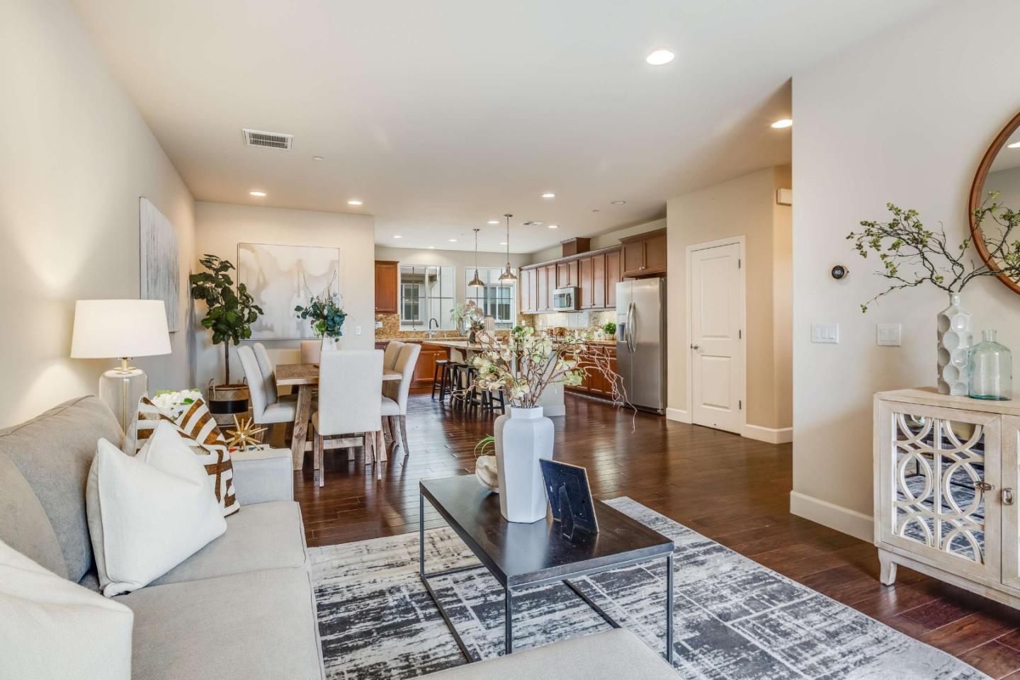 579 Holthouse Terrace Sunnyvale, CA 94087 - Photo 7 of 37 a living room with furniture and kitchen view