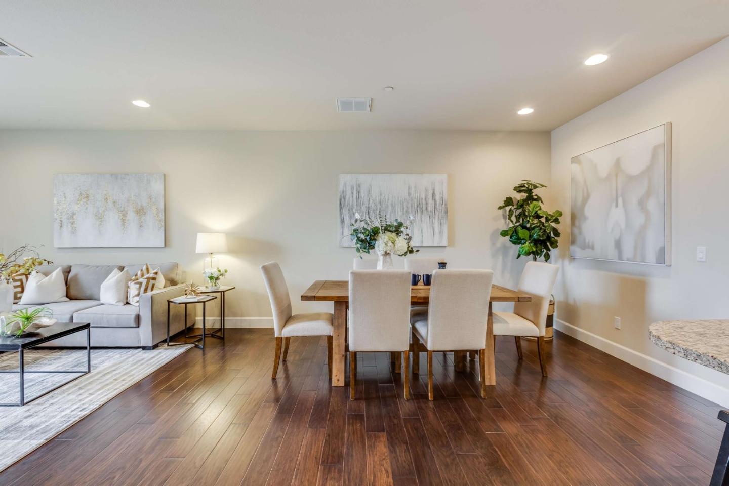 579 Holthouse Terrace Sunnyvale, CA 94087 - Photo 8 of 37 a view of a dining room with furniture and wooden floor