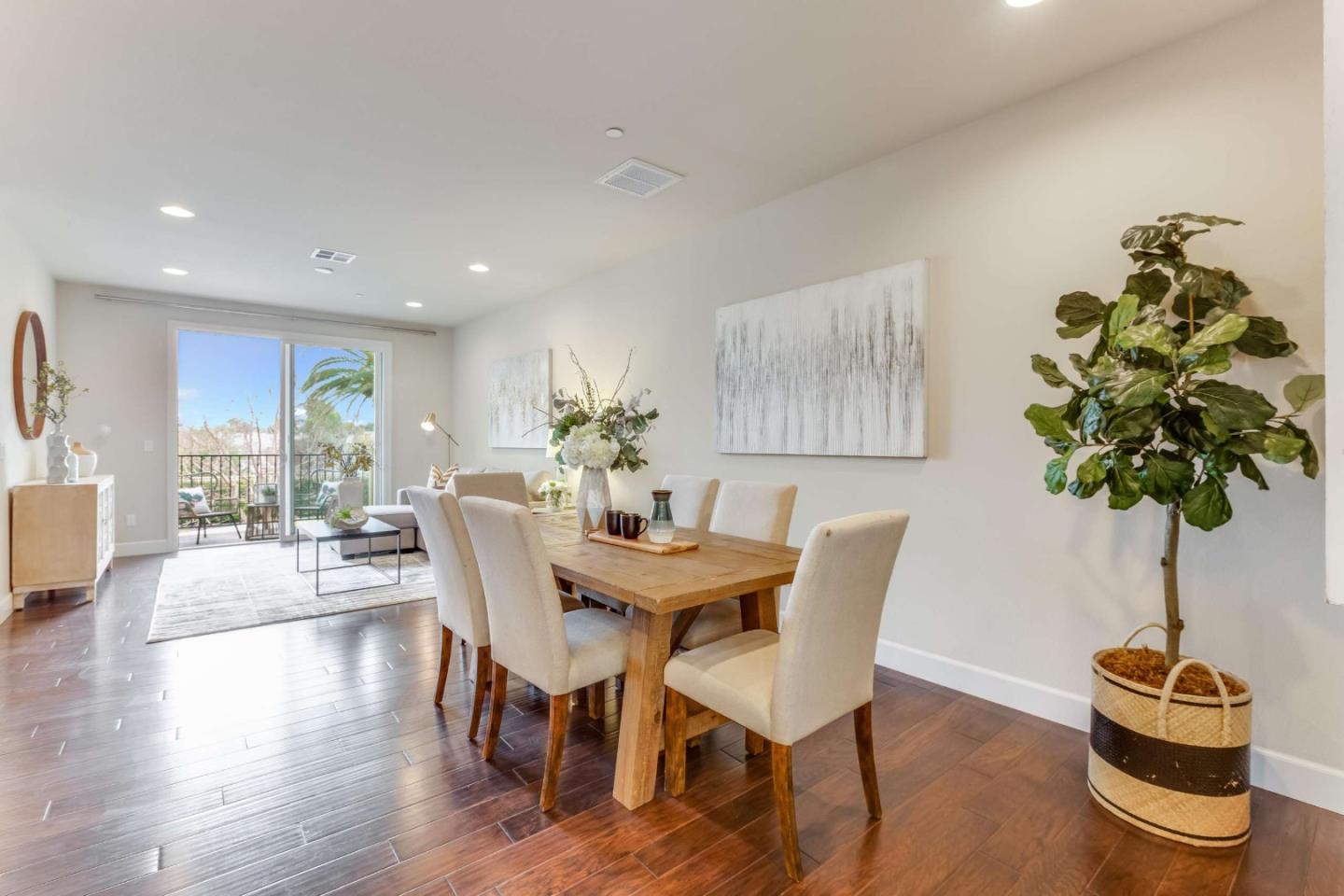 579 Holthouse Terrace Sunnyvale, CA 94087 - Photo 9 of 37 a view of a dining room with furniture and wooden floor