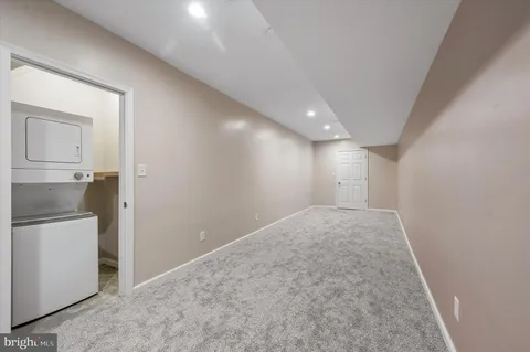 an empty room with a bathroom
