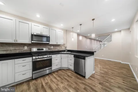 a view of a hallway with closet