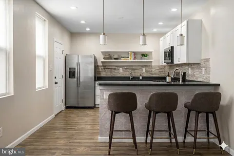 a bedroom with a bed and a cabinets