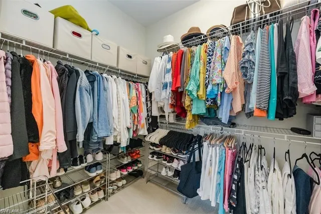 a bathroom with a shower sink and mirror